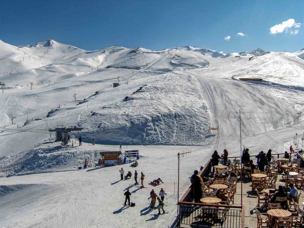 Chile-Custom-Private-Travel-Design-Santiago-Valle-Nevado-2 Group of skiers at the bottom of a run at Valle Nevado ski resort in Chile