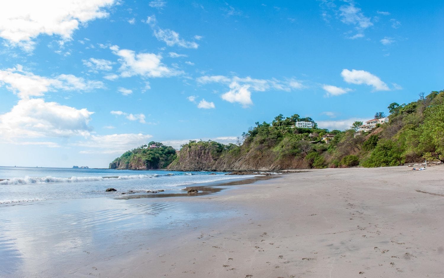 Costa-Rica-Central-Nicoya-Private-Custom-Travel-Design-12 Pristine brown sand beach in Central Nicoya, backed by dense green forest