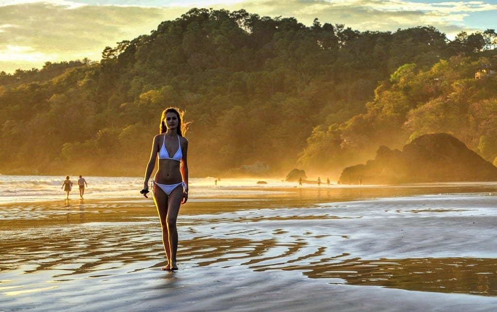 Young-beautiful-woman-beach Young beautiful woman, wearing white two piece on a beach in Costa Rica