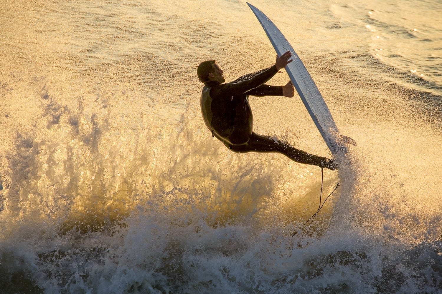 Custom-Travel-Vacation-Travel-Surfing Man surfing a wave off the beach of Northern Nicoya