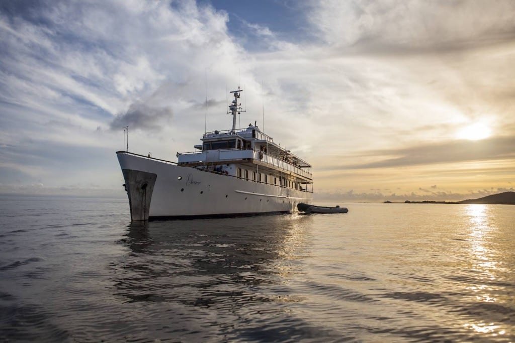 Grace-Blue-Sunset Galapagos Charter Yacht M/Y Grace on a Galapagos yacht cruise of the Islands at sunset
