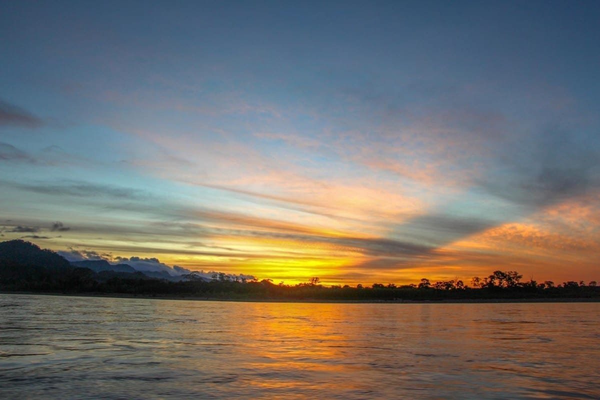 Landed-Travel-Private-Travel-Beni-River-Madidi-Bolivia Sunset over the Beni river in Madidi NAtional Park, Bolivia