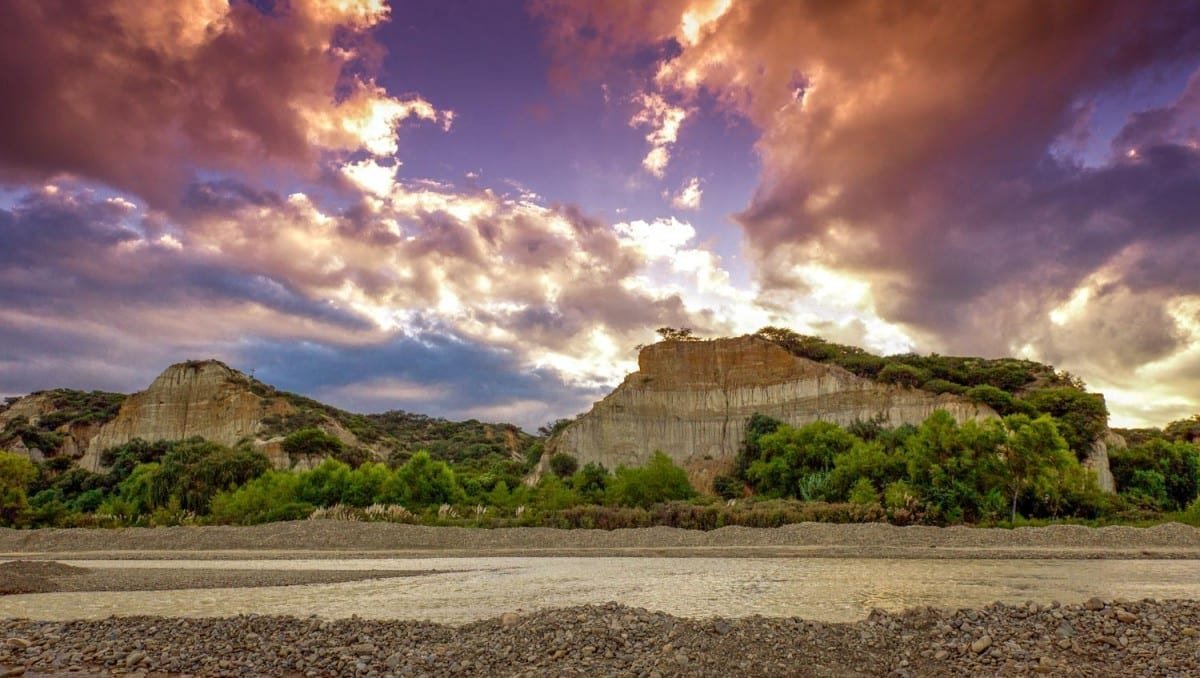 Landed-Travel-Private-Travel-Sunset-Cliffs-Madidi-Bolivia Purple-hued sky over the cliffs of Madidi park in Bolivia