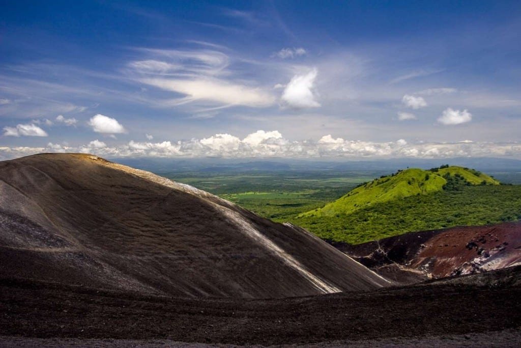 Private-Experiential-Travel-Nicaragua-Leon-Cerro-Negro-Volcano View from the top of Cerro Negro volcano near Leon, Nicaragua showing the lush green valley below