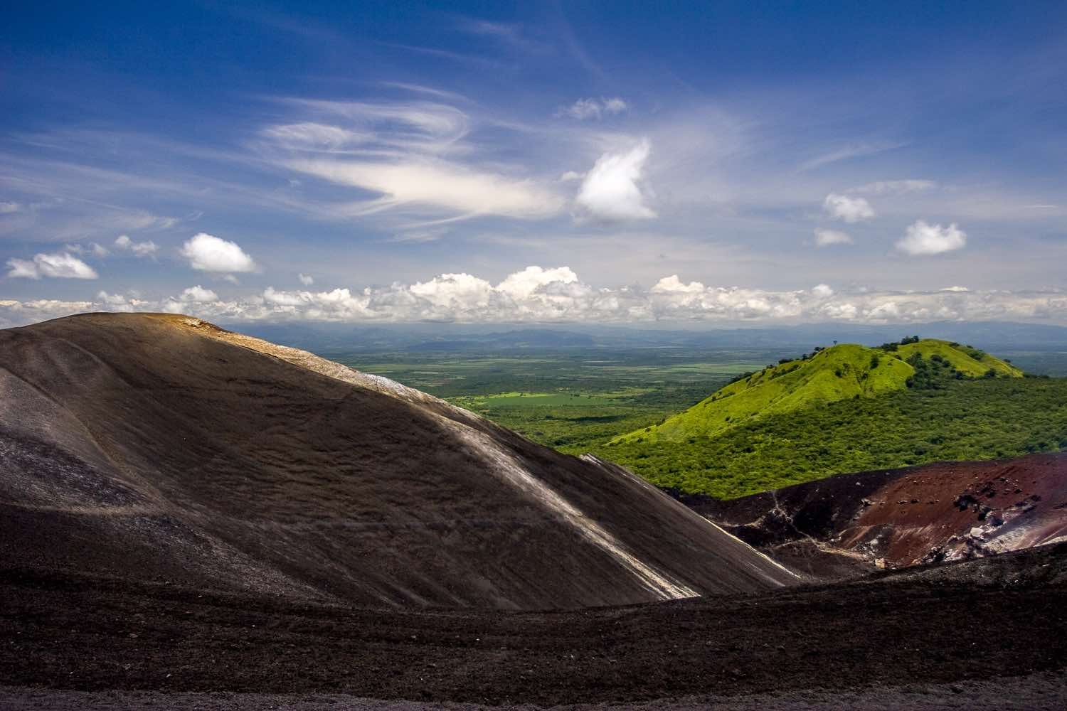 Private-Experiential-Travel-Nicaragua-Leon-Cerro-Negro-Volcano View from the top of Cerro Negro volcano near Leon, Nicaragua showing the lush green valley below
