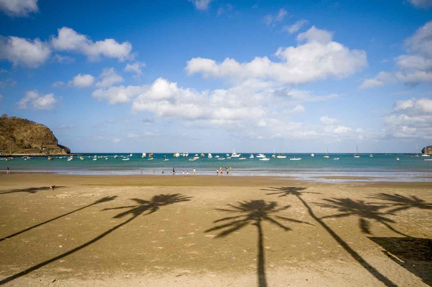 Private-Custom-Experiential-Travel-Nicaragua-San-Juan-del-Sur-Beach shadows of palm trees on surf beach of San Juan del Sur, Ncaragua