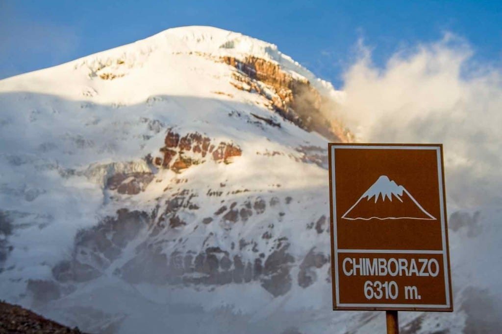 chimborazo-base-camp-Ecuador A brown alititude marker sign at the bottom of chimborazu base camp, photographed on a hiking tour