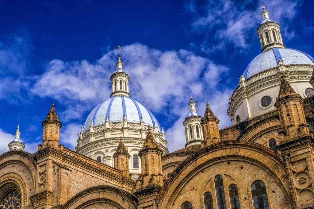 Private-TravelEcuador-Cuenca-Cathedral-Domes Twin baby blue domes of Cuenca Cathedral in Ecuador, deep clear blue sky in the background