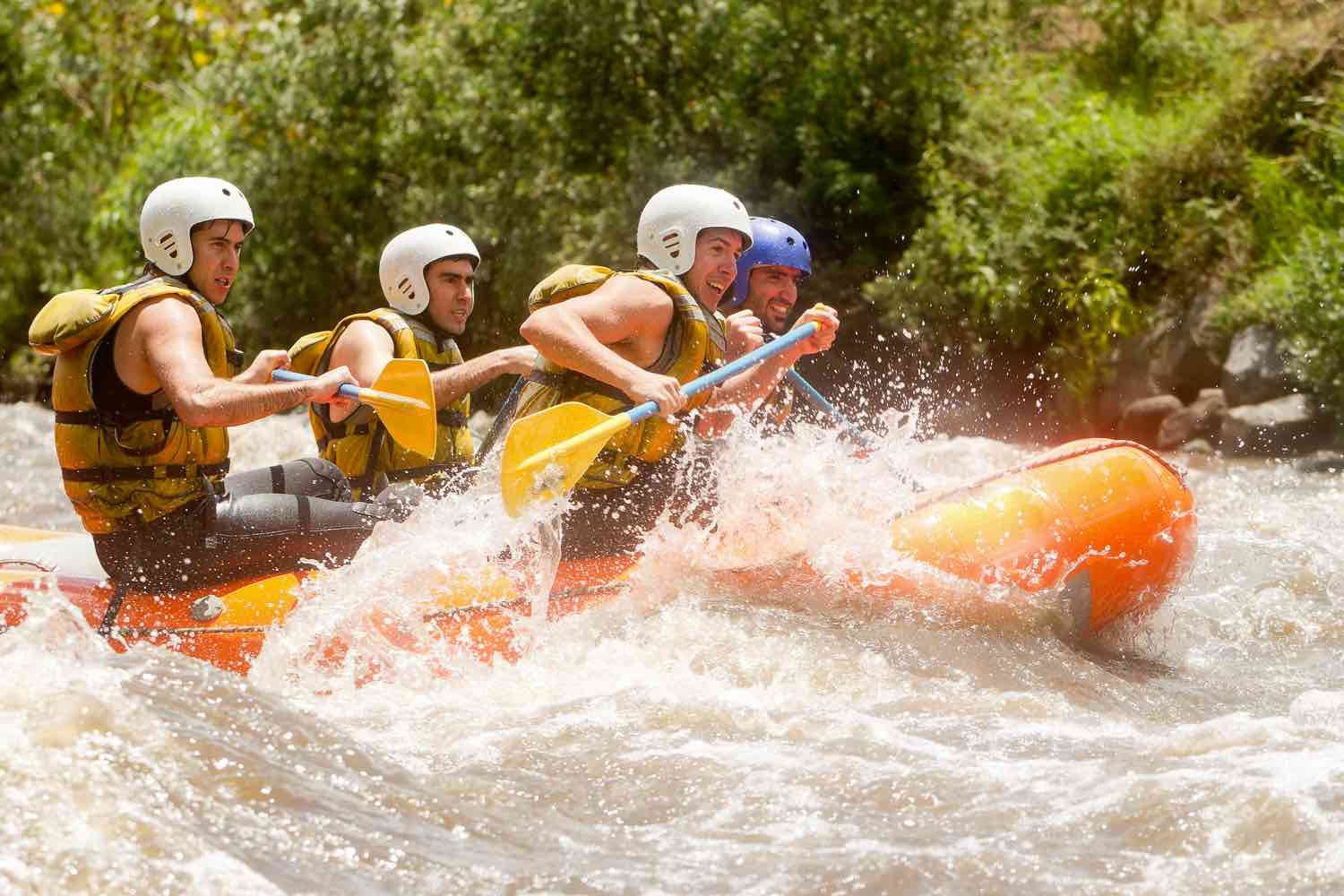 Private-Travel-Ecuador-Rafting Orange sunset over the Ecuadorian city of Banos, photographed on a family vacation to Ecuador