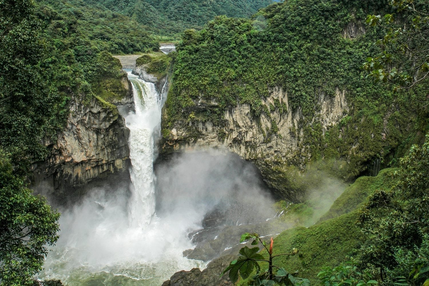 Private-Travel-Custom-Travel-Ecuador-San-Rafael-2 A booming waterfall cascading down a lush rockface near Mindo, Ecuador