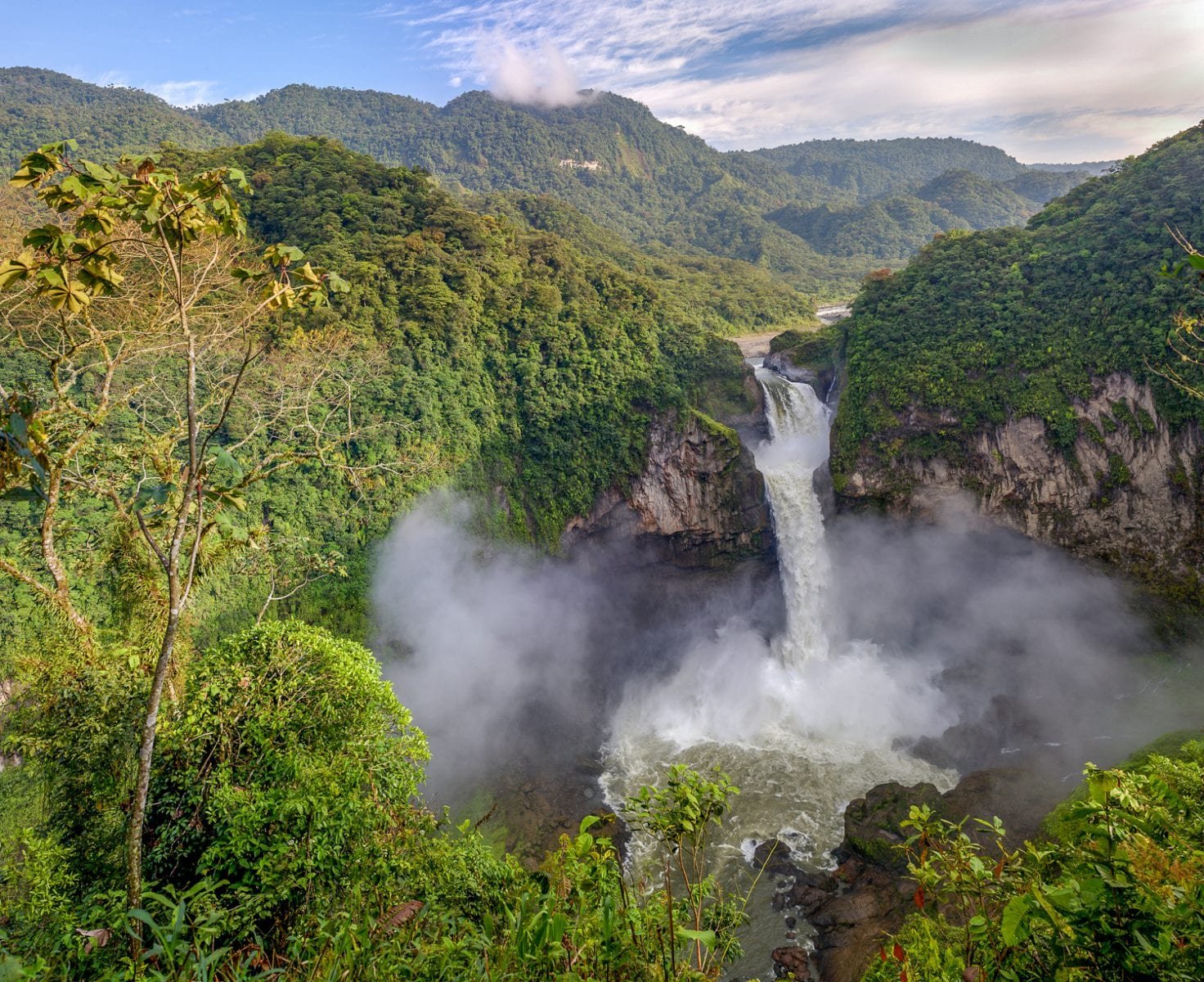 Custom-Travel-Ecuador-San-Rafael-Waterfall San Rafael Waterfal in Ecuador, Large booming white waterfall cascading over thickly-forested mountain ridge