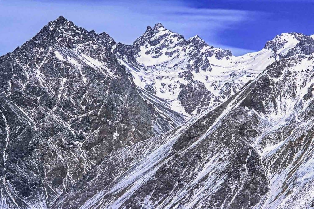 Private-Travel-Design-Chile-Skiing-Andes Snow-covered, granite-colored Andes Mountains in Chile
