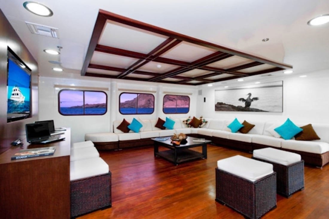 Cormorant-Motor-Catamaran-Charter-Galapagos-5 White couches in lounge area onboard the Cormorant-Motor-Catamaran-Charter in the Galapagos
