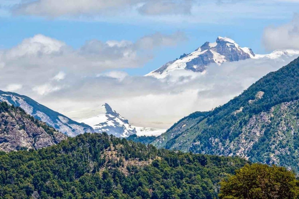 Cerro-Tronador-Hiking-Andes-Chile-Argentina Snow-covered Cerro Tronador volcano on the Argentina Chile border
