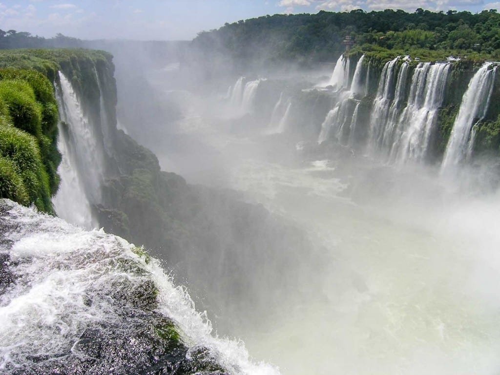 OLYMPUS DIGITAL CAMERA A photo of Iguazu falls, taken from a scenic overlook on a private tour of the area.