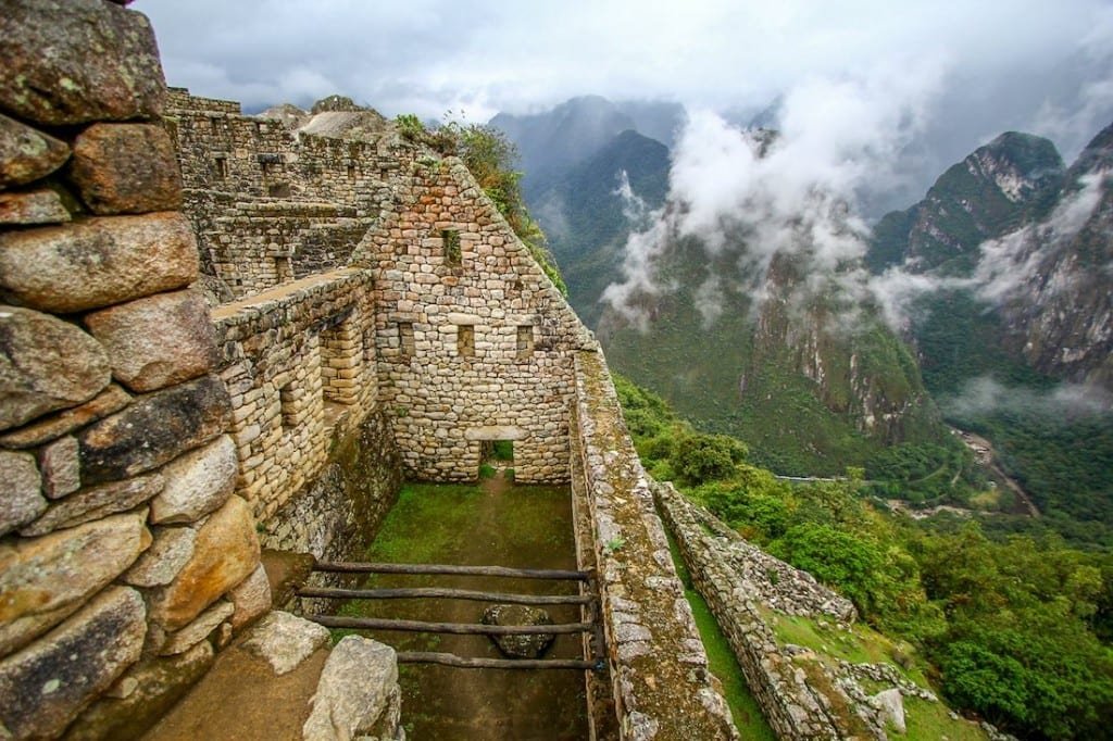 Private-Custom-Travel-Design-Machu-Picchu-Residential-Quarter Machu Picchu Presidential Quarter, a triangular wall with small windows cut into it