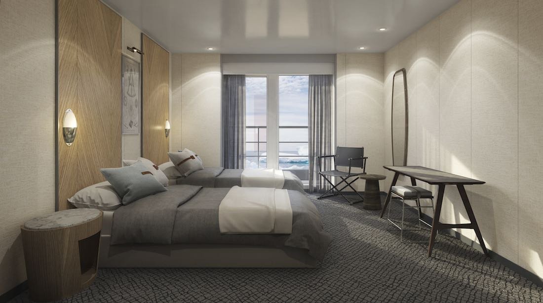 Cabin-Antarctica-Luxury-Expedition-Ship Two beds with luxury linens onboard Antarctic Expedition Cruise Ship
