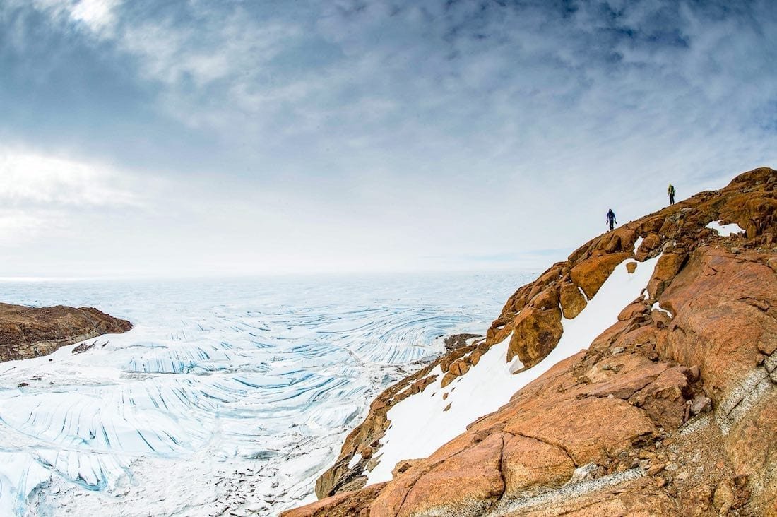 Antarctica-Luxury-Lodging-Antarctic-Travel-White-Desert Guests at Antarctic Hotel White Desert Whichaway Camp overlooking expansive Antarctic snow
