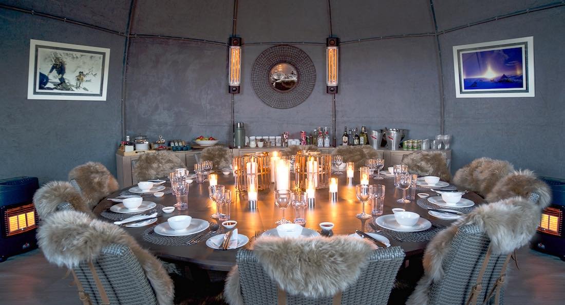 Luxury-Antarctica-Lodge-Whichaway-White-Desert Fine Dining room at the finest hotel in Antarctica, Whichaway Camp by Antarctic Proprietor White Desert. Showing large circular table with elegant settings