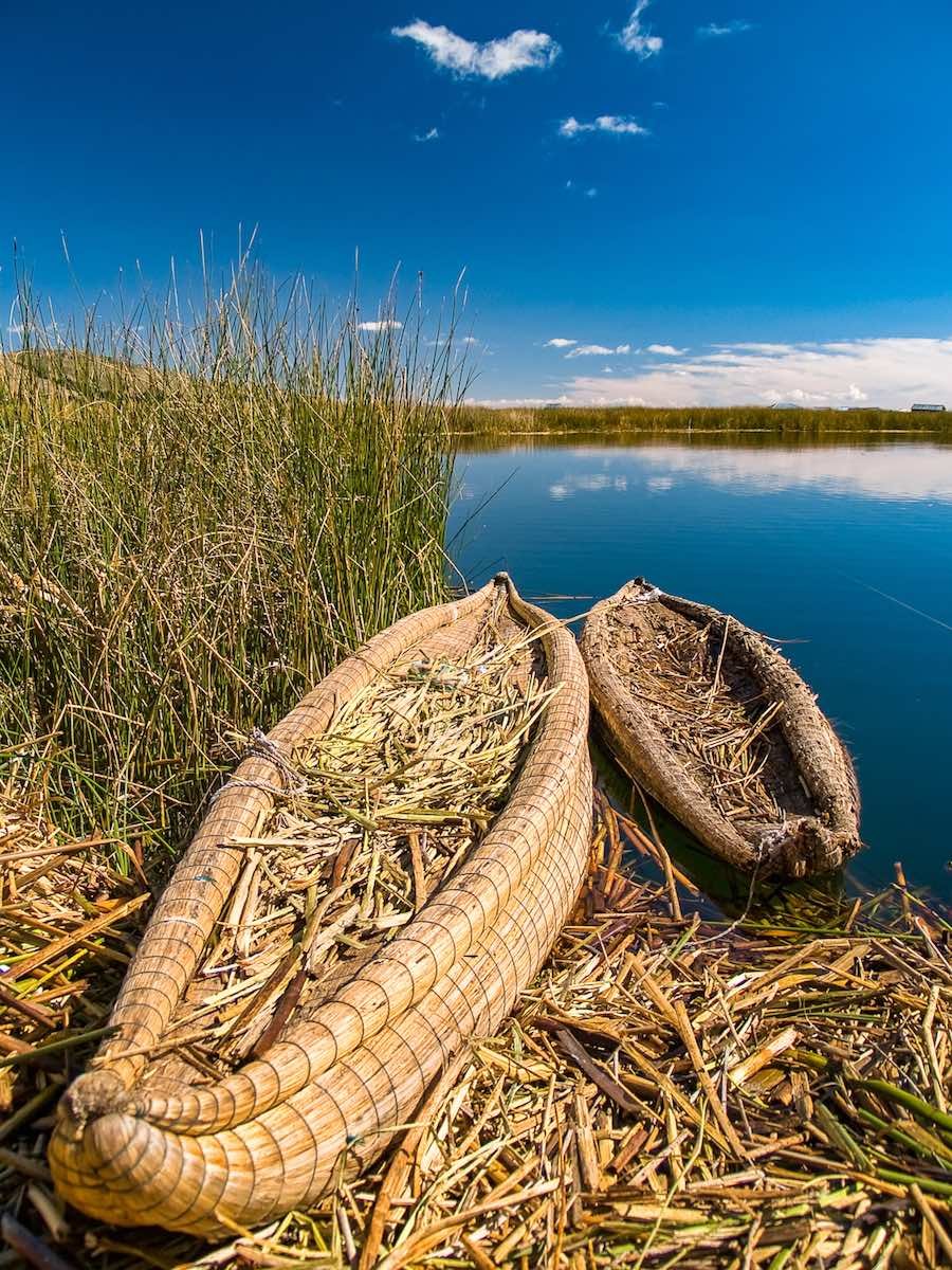 Uros-Island-boats-Lake-Titicaca-Peru Floating Uros Island boats on Lake Titicaca in Peru
