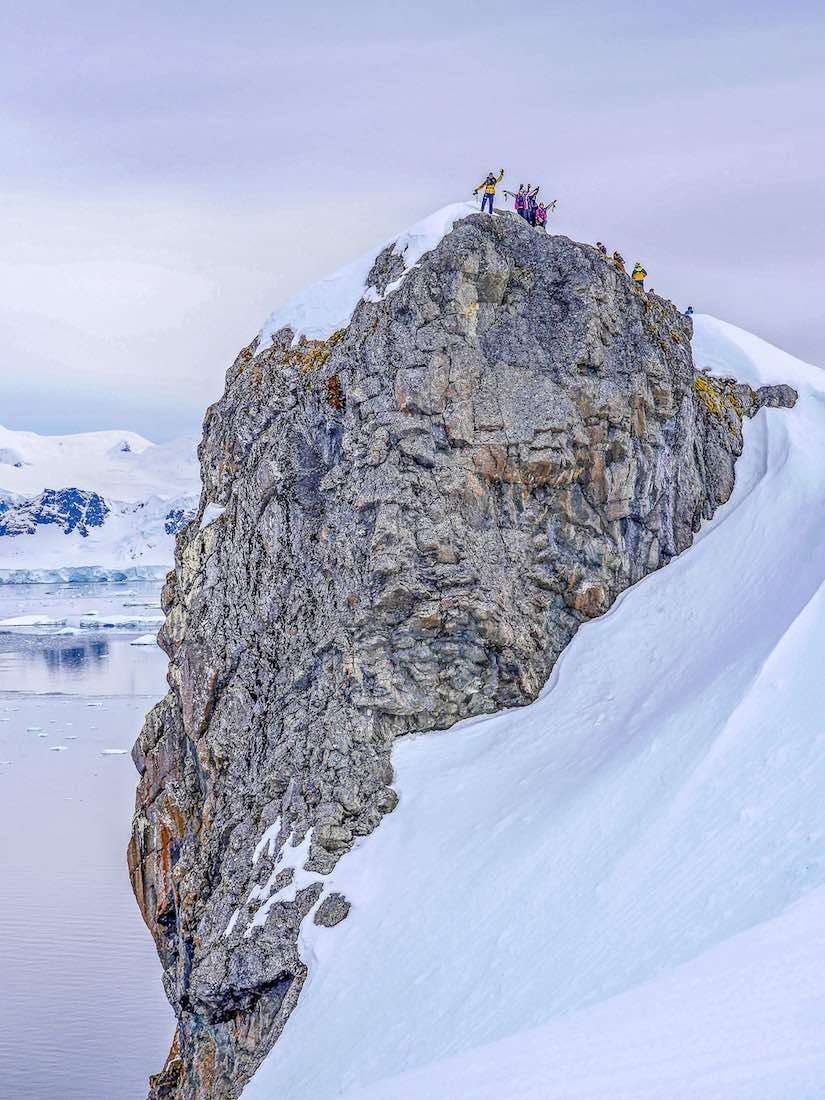 Antarctica-Wildlife-Watching-Penguin-Tour Group of people on vacation in Antarctica looking for penguins on a tour of the Animals of Antarctica