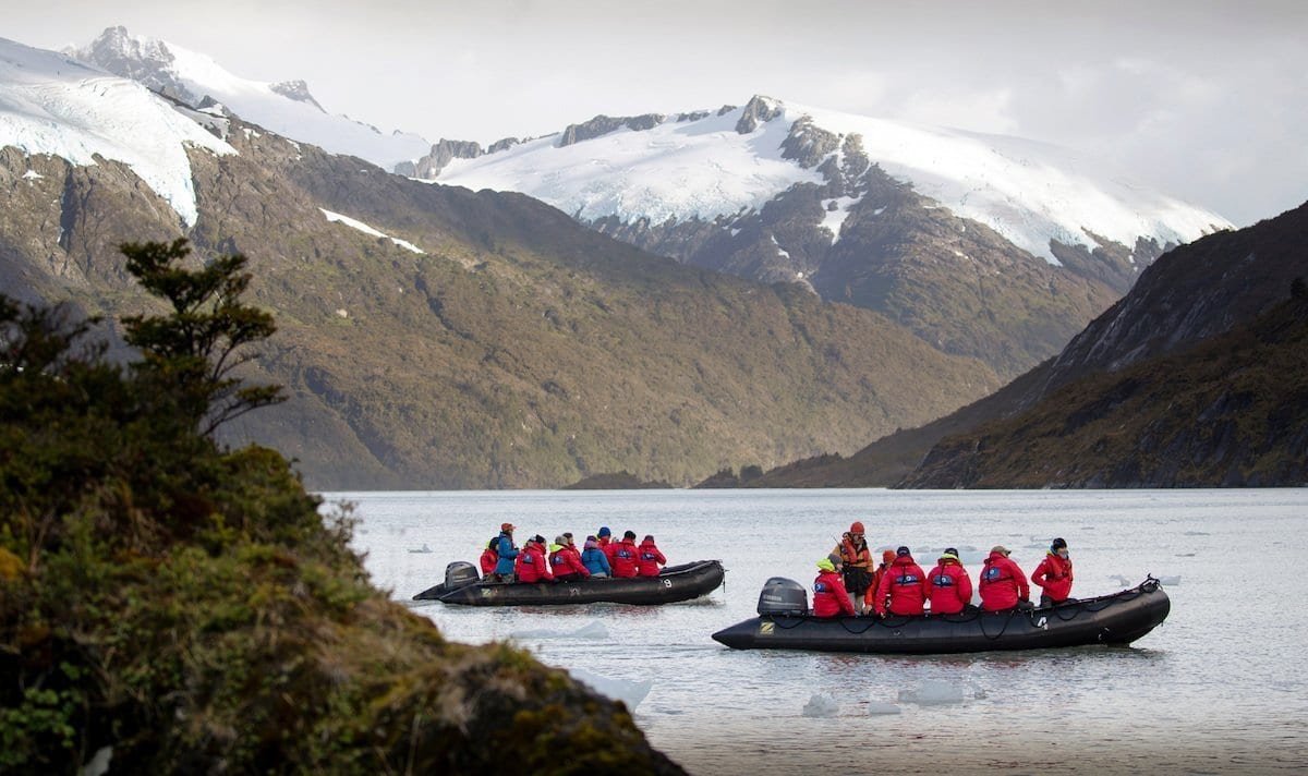 JasonRansom-OOE-2019-04-02-14052 The One Ocean offers zodiac boat tours of tall mountains and snow capped peaks.
