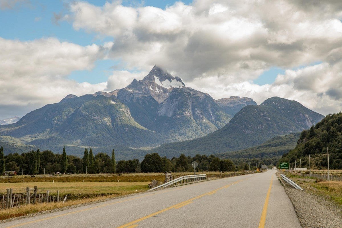 Landed-Travel-Chile-Aysen-99 Towering Paine Mastif touching the clouds over Patagonia, photographed from Ruta 7 on a roadtrip through Chile