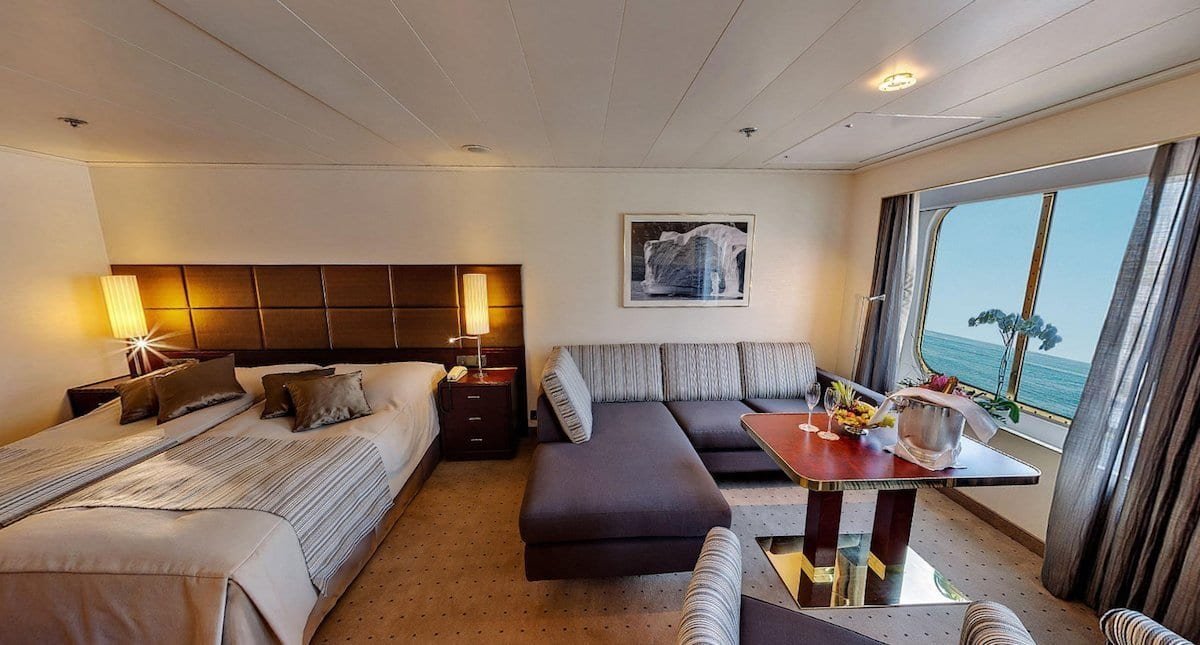One Ocean Suite_RCGS Resolute the RCGS Resolute suite features a bed, small sitting area and spectacular rooms.