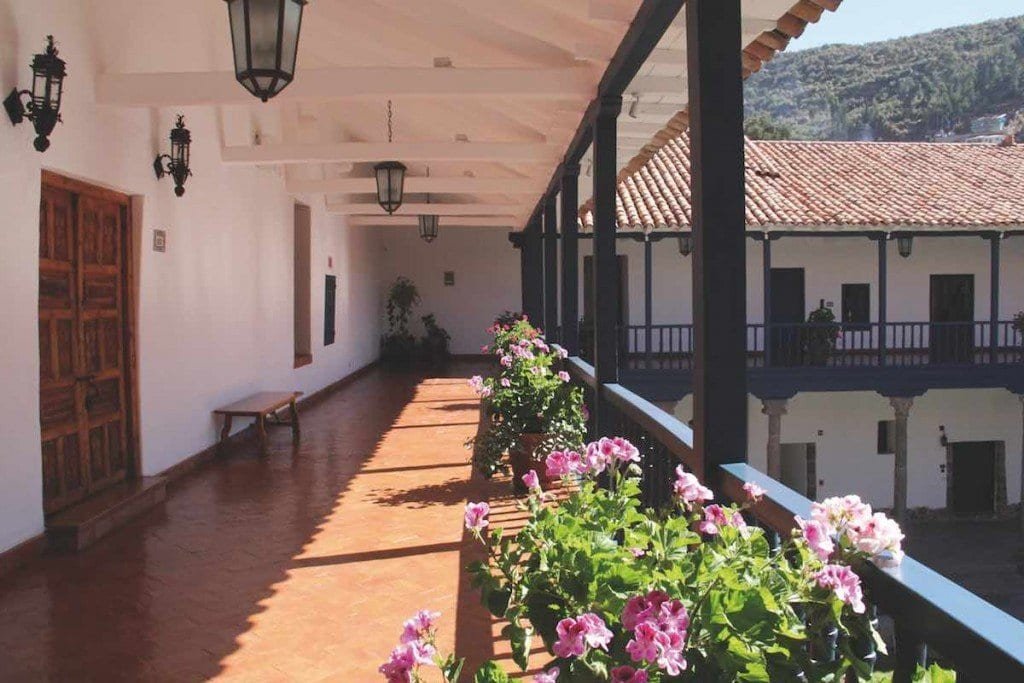 Belmond-Palacio-Nazarenas-exterior-Michelle-Heimerman Belmond Palacio Nazarenas exterior buildings feature patios and floral courtyards.