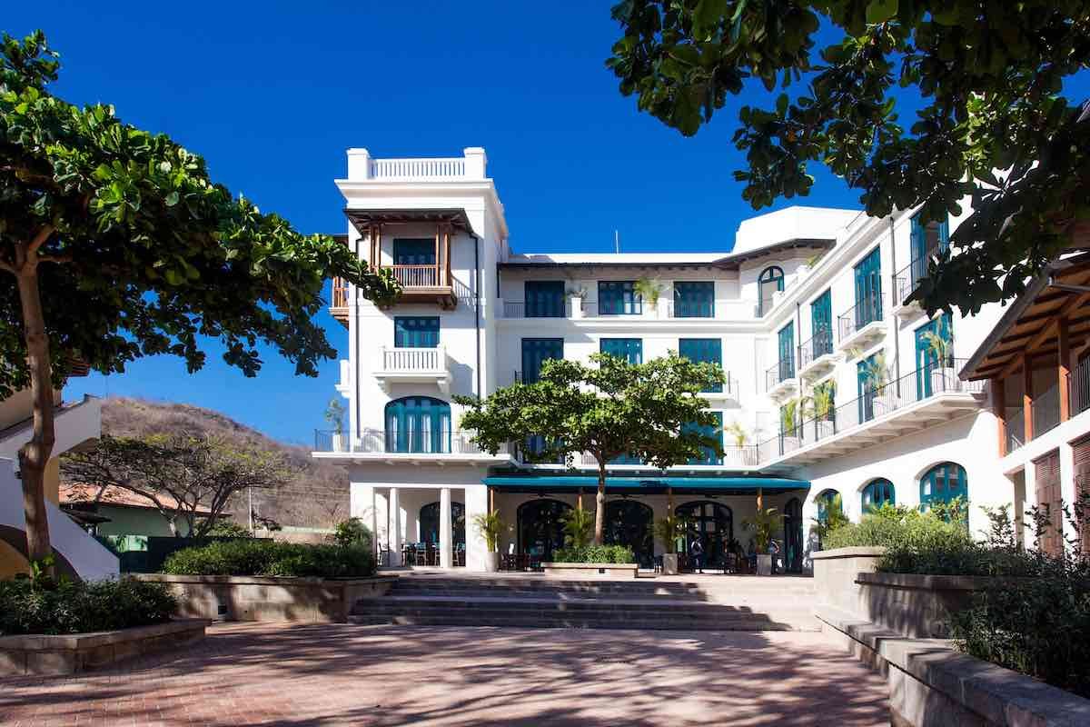 Santarena-Exterior The exterior of Santarena features white wash walls and turquoise shutters.