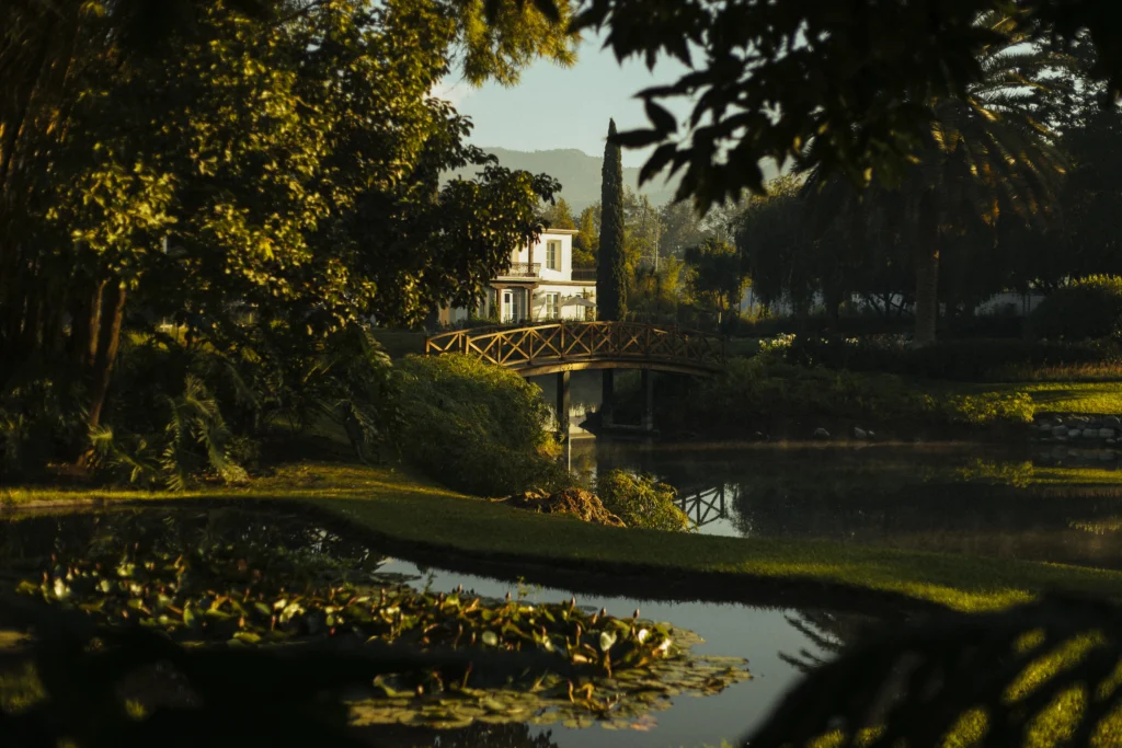 Villa Bokeh manicured gardens beneath three volcanoes in Antigua Guatemala